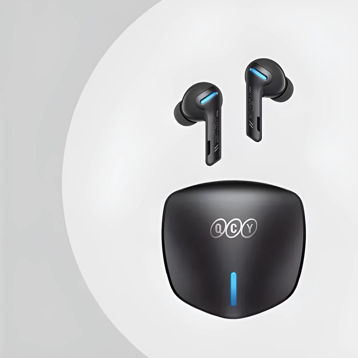 Grey QCY G1 Bluetooth wireless gaming earbuds with charging case and spare ear tips.