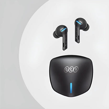 Grey QCY G1 Bluetooth wireless gaming earbuds with charging case and spare ear tips.