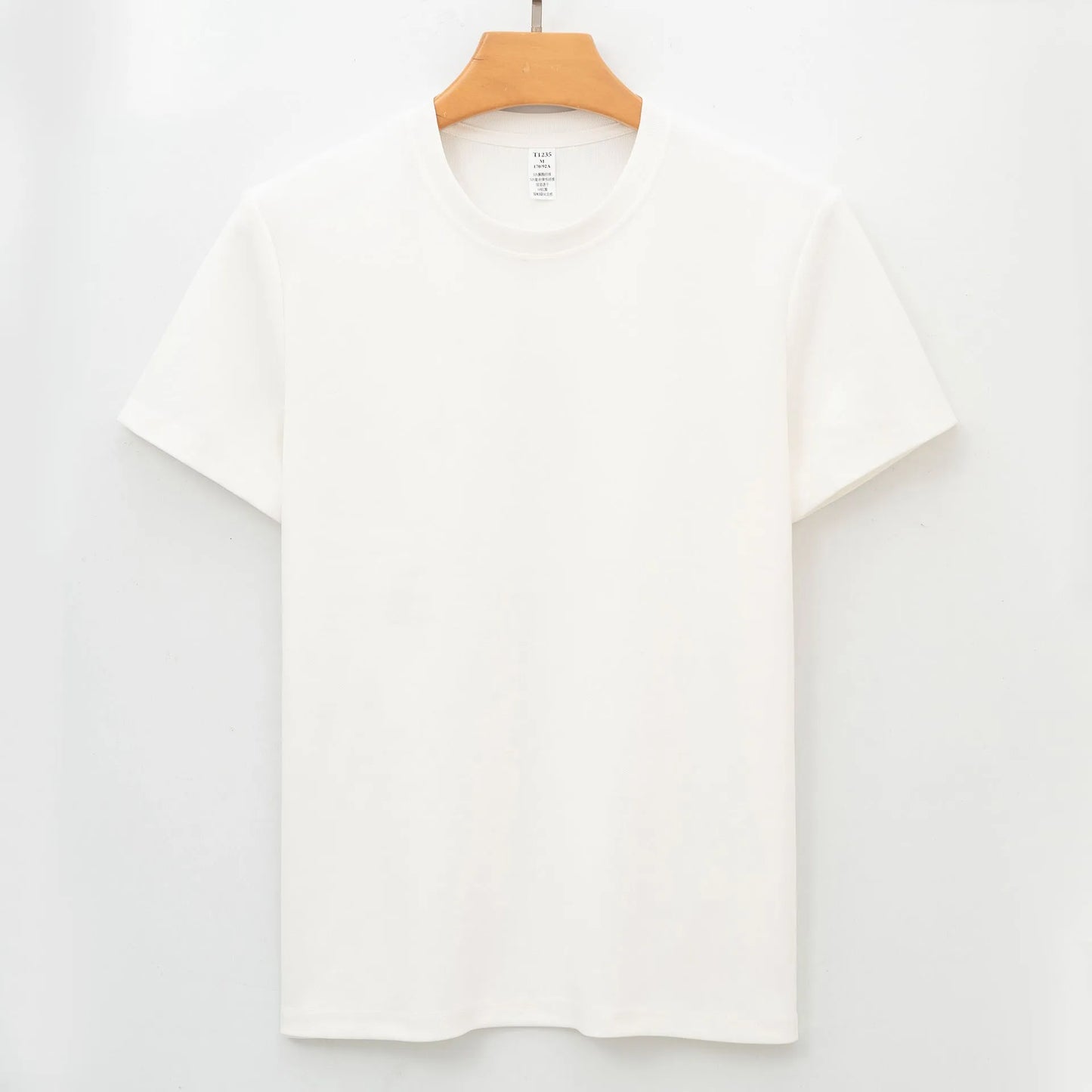 Men's solid colour antibacterial quick-dry short sleeve T-shirt on a hanger.