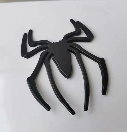 Three-dimensional metal spider bumper sticker in zinc alloy measuring 7cm by 5cm