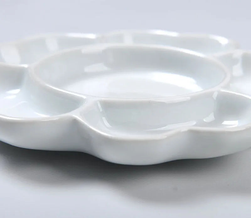 White handmade ceramic plum blossom shaped paint palette for watercolour, acrylic, and oil painting