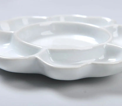White handmade ceramic plum blossom shaped paint palette for watercolour, acrylic, and oil painting