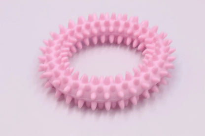 TPR spiky circle ring dog chew toy in assorted colours showing dental cleaning nubs