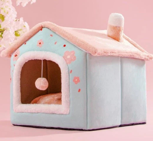 A cozy and comfortable pet bed with a self-warming fabric, durable non-slip base, and removable machine-washable cover