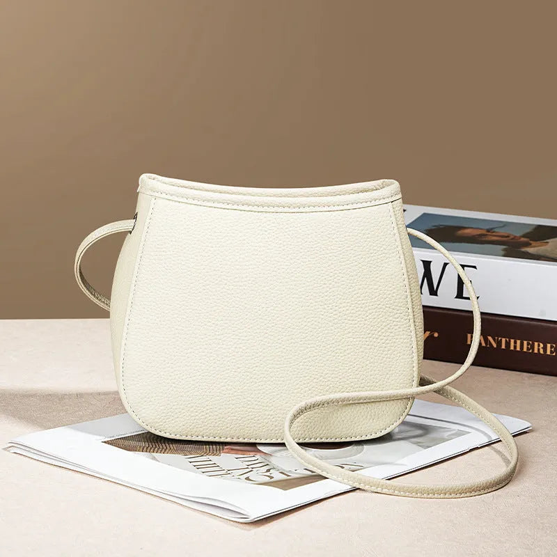 Genuine leather cowhide messenger bag for women in square vertical shape with organised internal compartments
