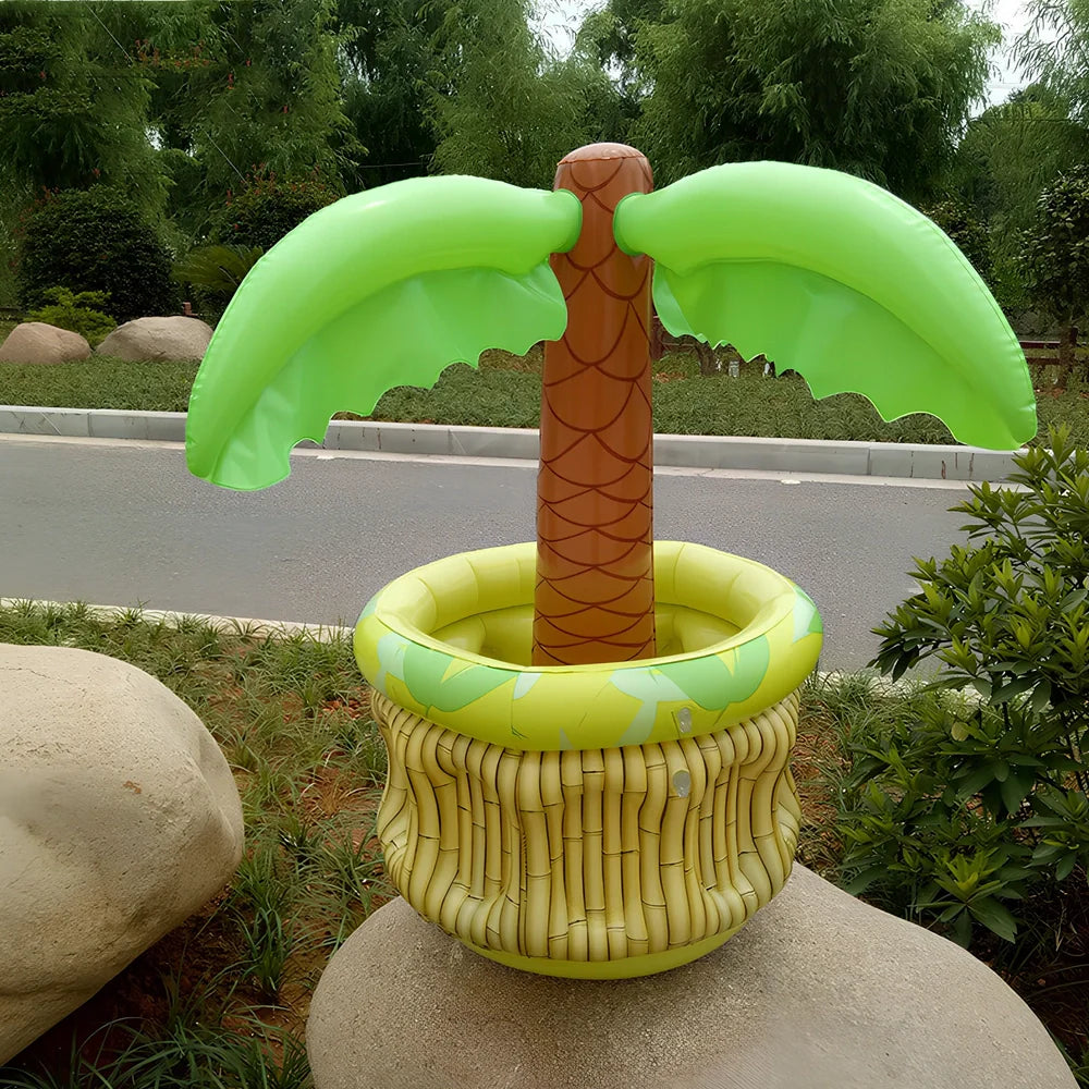 Green inflatable palm tree shaped cooler with coconut details holding beer bottles and ice