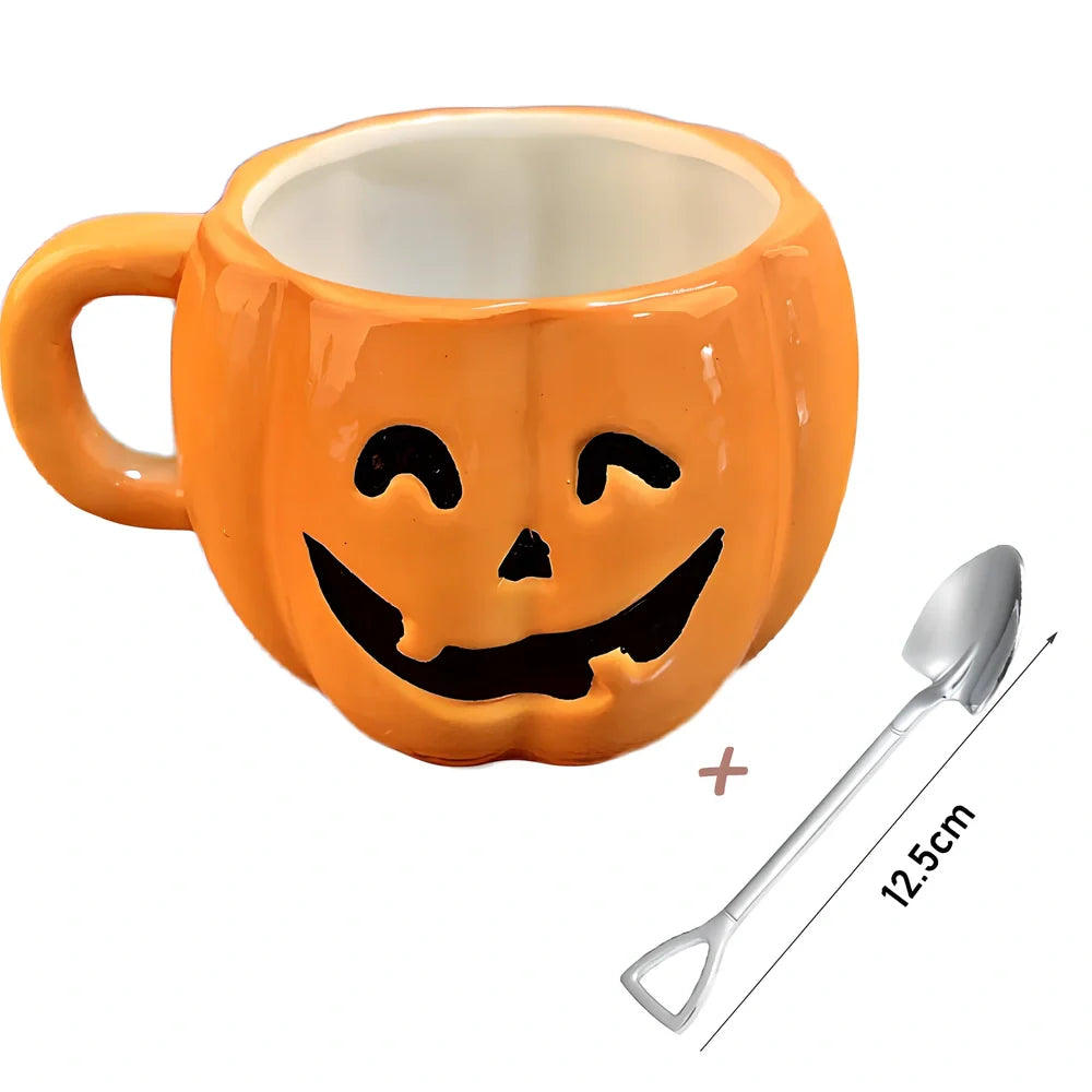Orange ceramic Halloween pumpkin mug with cartoon face and included spoon on autumn table