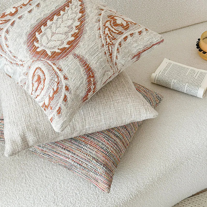 American-style yarn-dyed jacquard sofa pillow cover with thickened paisley design in amber colours, showing plant and flower pattern.