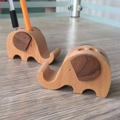 Beech wood mobile phone holder with coin slot showing adjustable angle and resin decorative elements