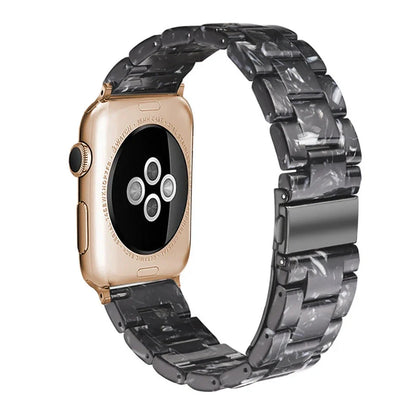 Slim resin Apple Watch strap showing attachment mechanism and colour options
