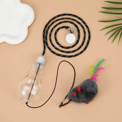 Grey and yellow interactive cat toy hanging on door frame with retractable elastic rope and treat dispenser