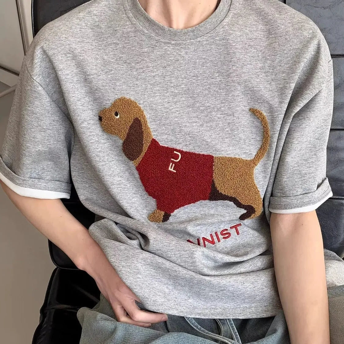 Men's grey cotton t-shirt with embroidered sausage dog design on front, short sleeves, round neck