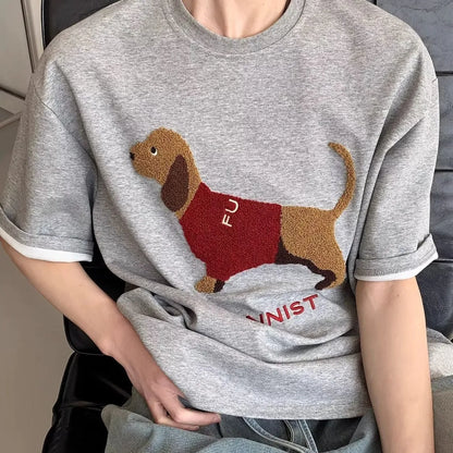 Men's grey cotton t-shirt with embroidered sausage dog design on front, short sleeves, round neck