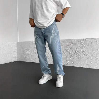 Men's blue straight-leg denim trousers with mid-waist design and zipper fly closure