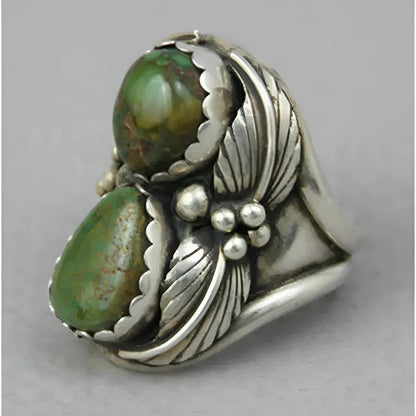 Geometric turquoise alloy ring with electroplated finish showing inlaid patterns, available in UK sizes 6-10