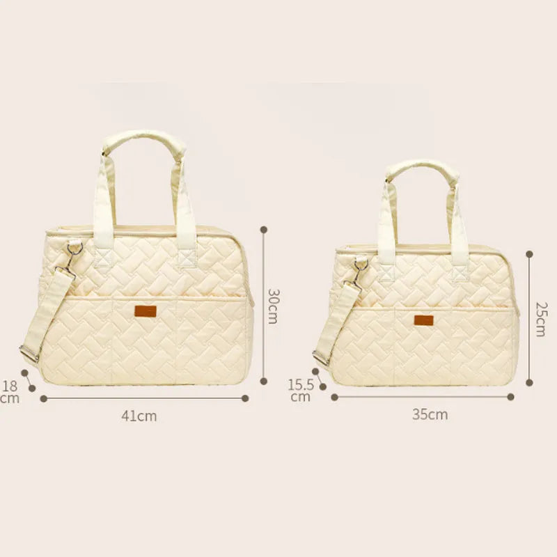 Grey or white cat carrier handbag with breathable mesh panels, safety cord, and multiple pockets for small pets