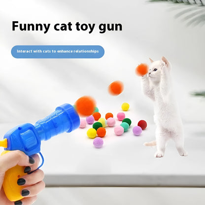 Interactive plastic pet toy gun and soft plush yarn balls on a carpet for fetch games.