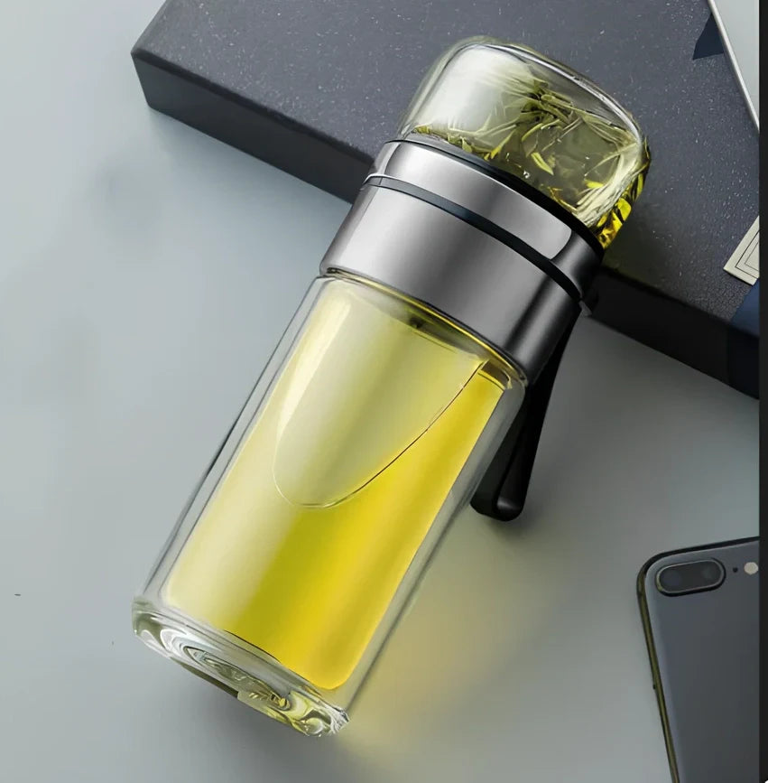 Wood grain separated tea cup with double-wall borosilicate construction and leak-proof lid showing measurement markings