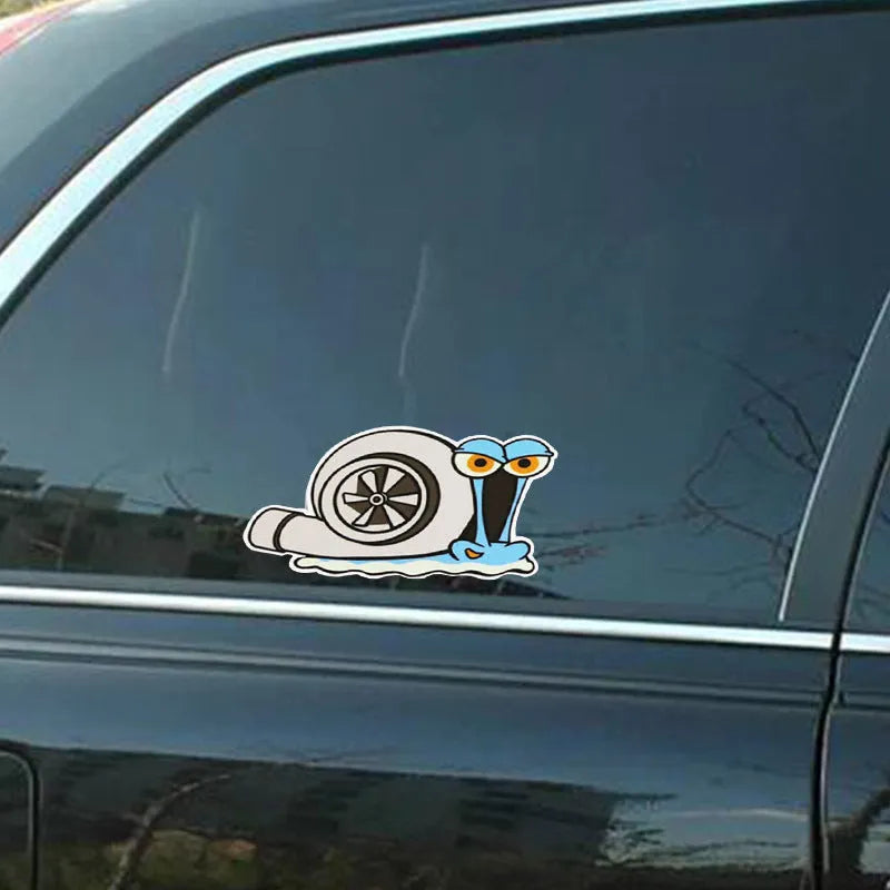 Reflective cartoon snail car sticker measuring 12x8cm with adhesive backing