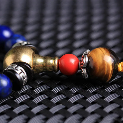 Natural lapis lazuli 108 bead bracelet with zodiac animal modelling in blue stone with gold flecks