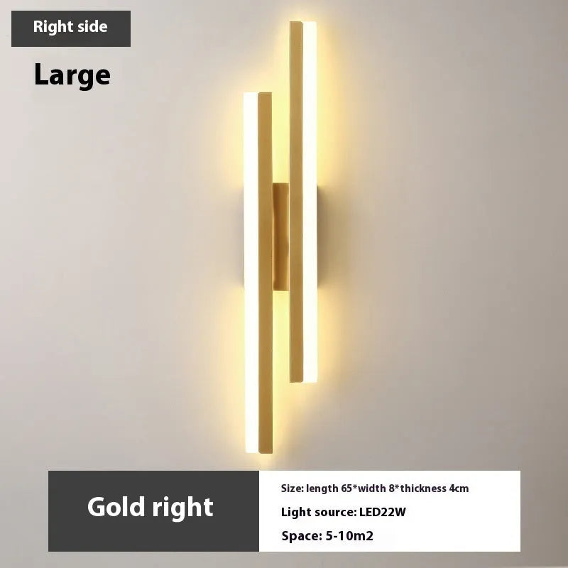 Scandinavian minimalist LED wall light with acrylic shade and adjustable arm in black or gold finish.