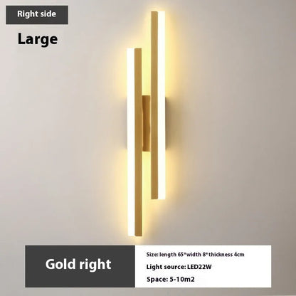 Scandinavian minimalist LED wall light with acrylic shade and adjustable arm in black or gold finish.