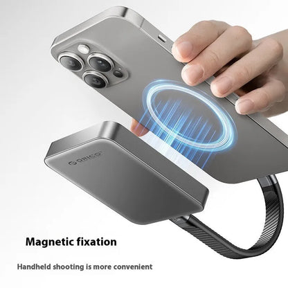 Grey magnetic mobile solid state drive with ultra-thin design and magnetic suction ring for phones and computers