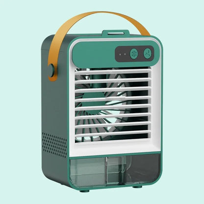 Dark green compact desktop air humidifier with USB port on a wooden desk.