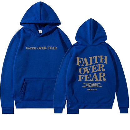 A stylish Christian hoodie with inspirational graphics and a message of faith over fear