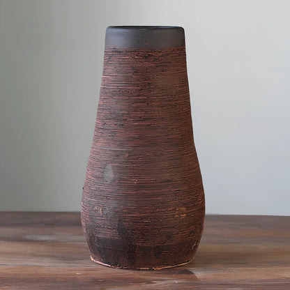 Ceramic mosaic vase with dried flowers, showing mosaic pattern and 25cm height