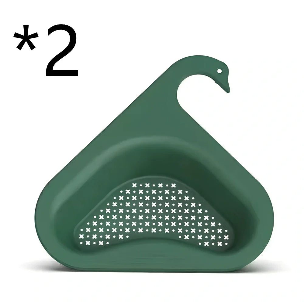Yellow swan-shaped plastic kitchen drainer basket with drainage holes on kitchen counter