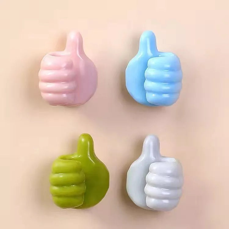 Silicone thumb wall hooks in various colors for organizing kitchen and bathroom items