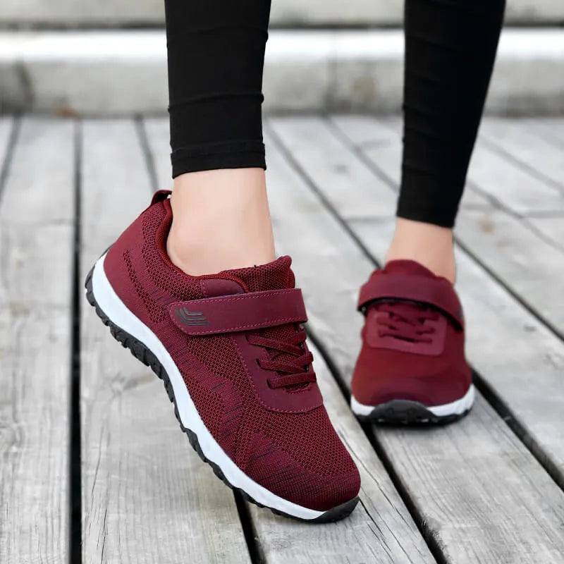 Women's grey purple soft sole velcro shoes with a low-top mesh upper and wedge heel.