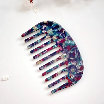 Retro acetate hair comb in cherry blossom powder colour showing 10x6.2cm dimensions and rounded teeth