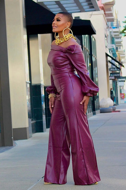 Women's wine red leather suit with detailed stitching, front and back views