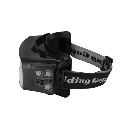 Black automatic welding mask with auto-darkening lens showing 122.5x35mm viewing area and dual sensors