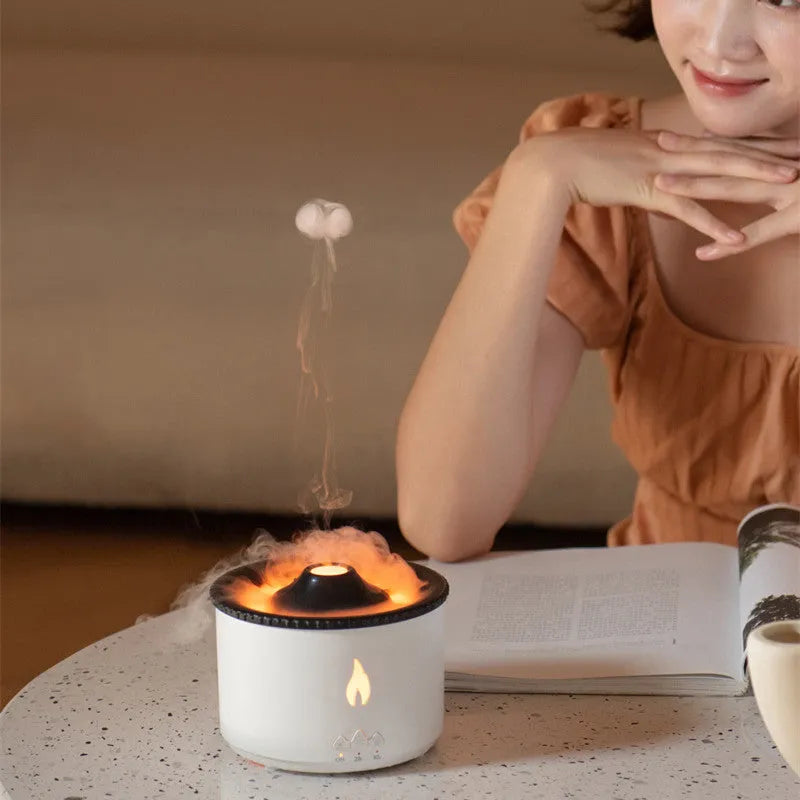 Colourful volcano-shaped cool mist humidifier with aromatherapy tray and flame-effect night light.