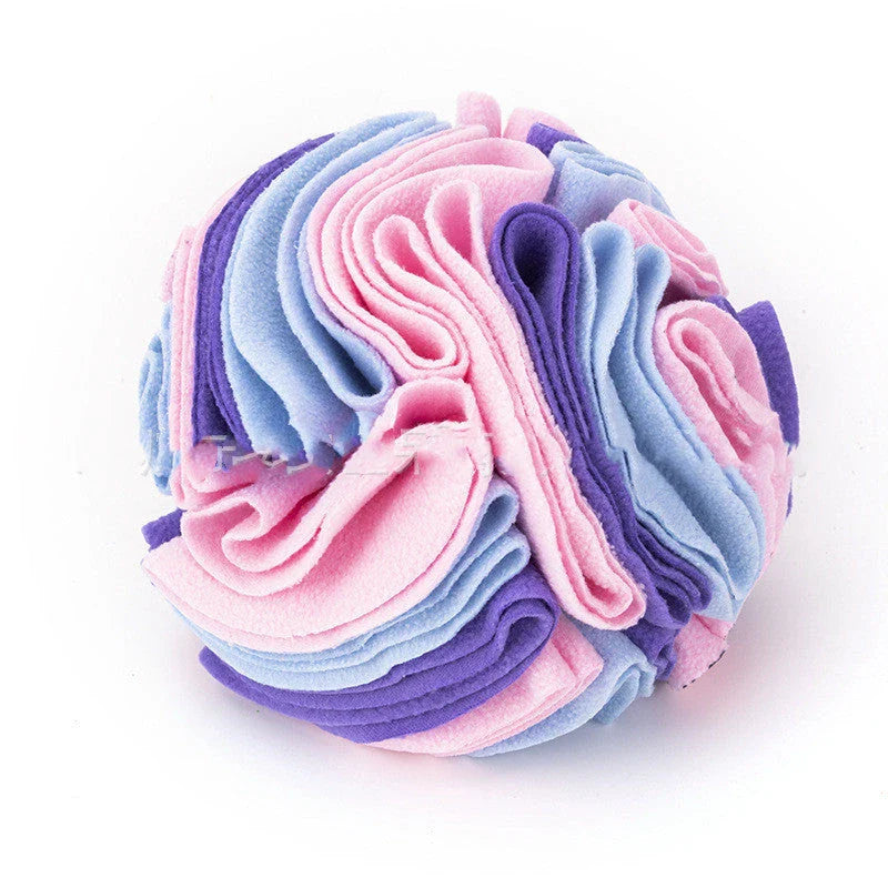 Soft and interactive puzzle ball toy made of polar fleece for dogs and cats to sniff and forage for hidden treats