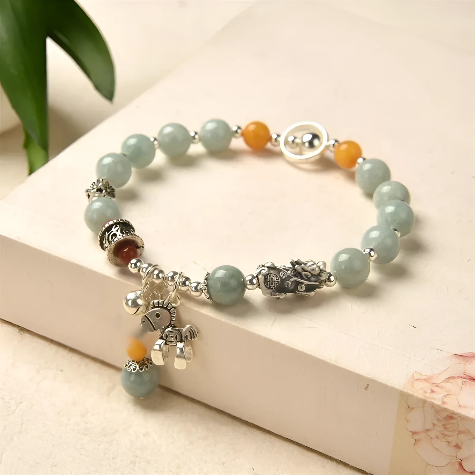Natural jade and alloy vintage bracelet with retro style and pony bracelet design