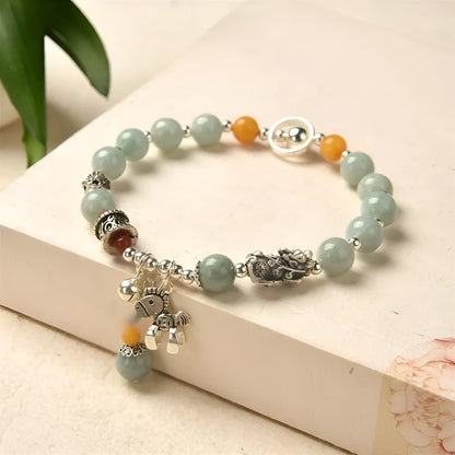 Natural jade and alloy vintage bracelet with retro style and pony bracelet design
