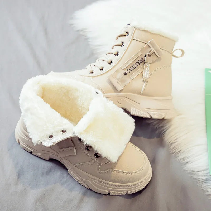 Plus size women's fleece-lined snow boot with tall crown, mid-heel, and front lace-up fastening.