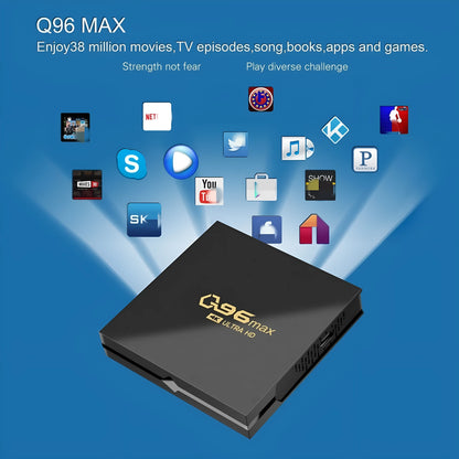 Q96 MAX Android TV set-top box with remote control and HDMI cable on a wooden surface.