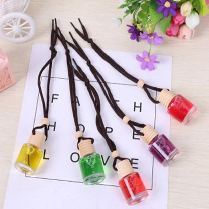 Glass bottle car air freshener hanging ornament with six scent options including lavender, lemon and apple