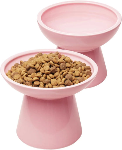 Elevated wide shallow ceramic cat food and water bowl in blue, green, pink, or white colour options.