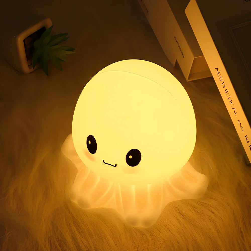 White jellyfish-shaped night light with octopus tentacle details and rechargeable lighting modes