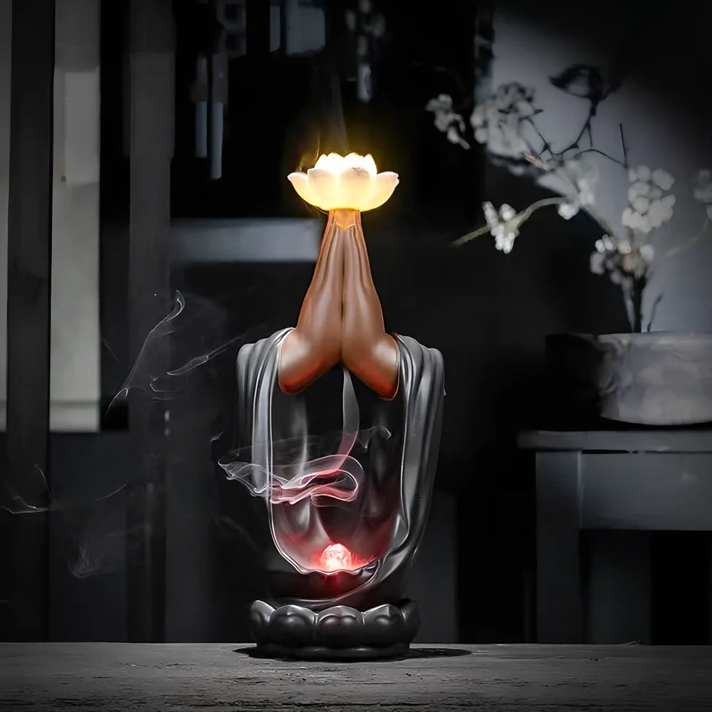 Purple sand tea pet backflow fragrance ornament with LED lighting creating cascading smoke effect