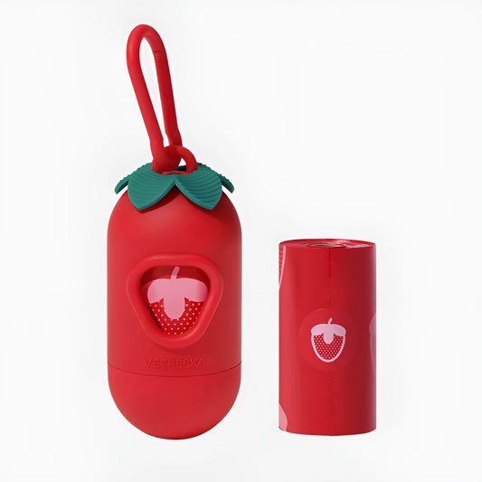 Plastic dog poop bag dispenser capsule clipped to a lead next to a roll of scented waste bags.