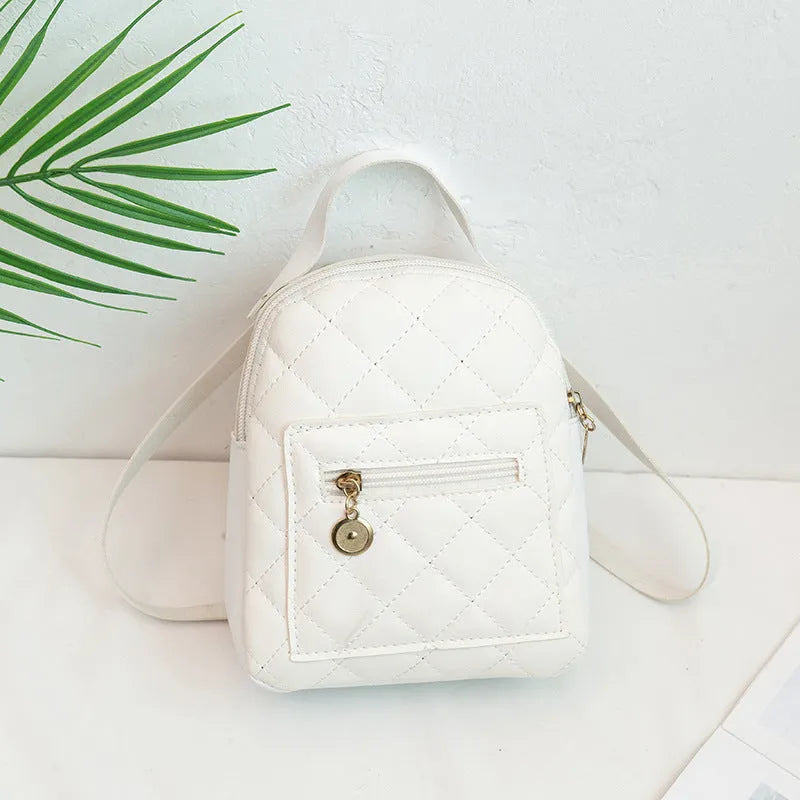 Girls' Korean style embroidered backpack in solid colour with hard PU construction and sandwich pocket
