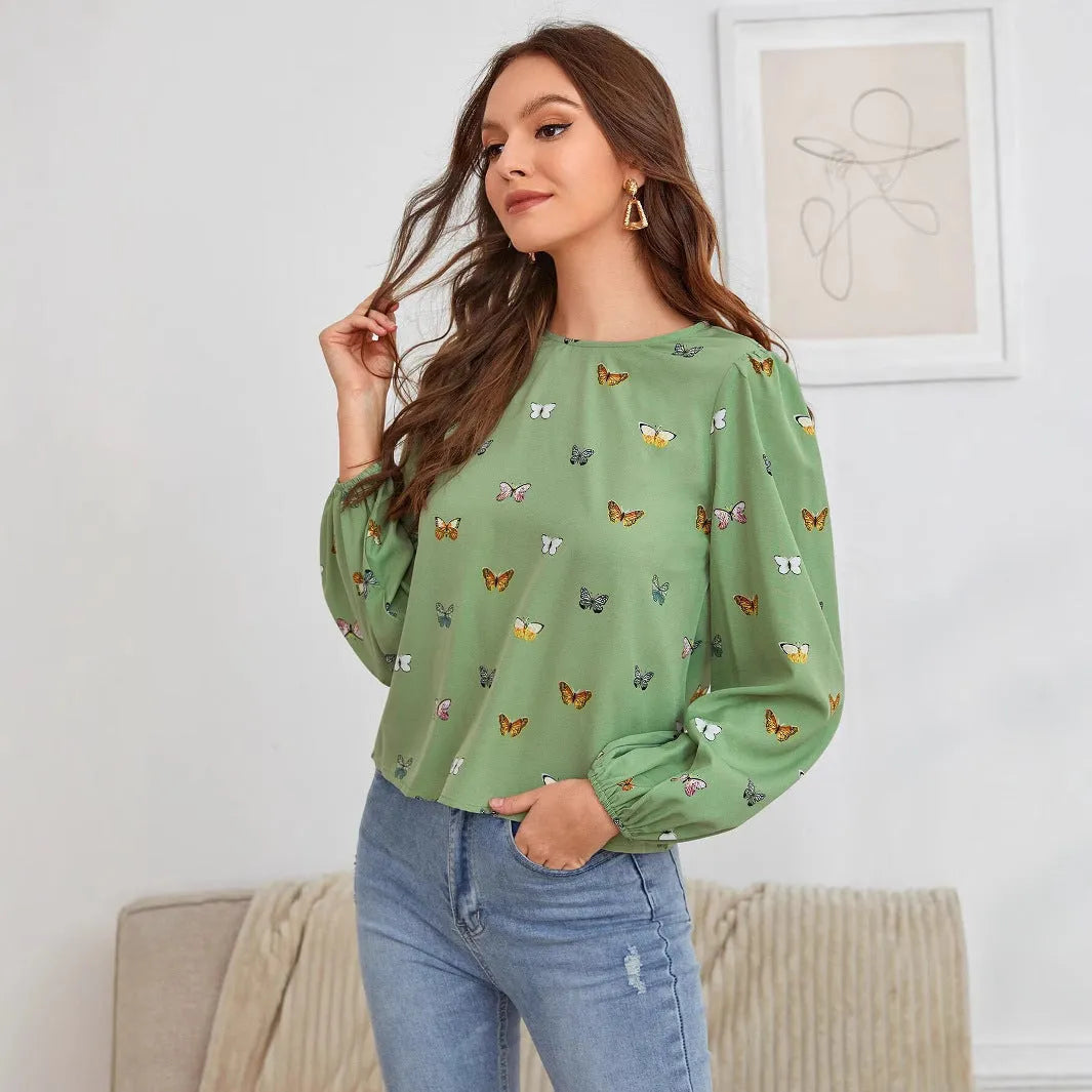 Women's loose fit long-sleeved shirt with colourful butterfly print in green colour option
