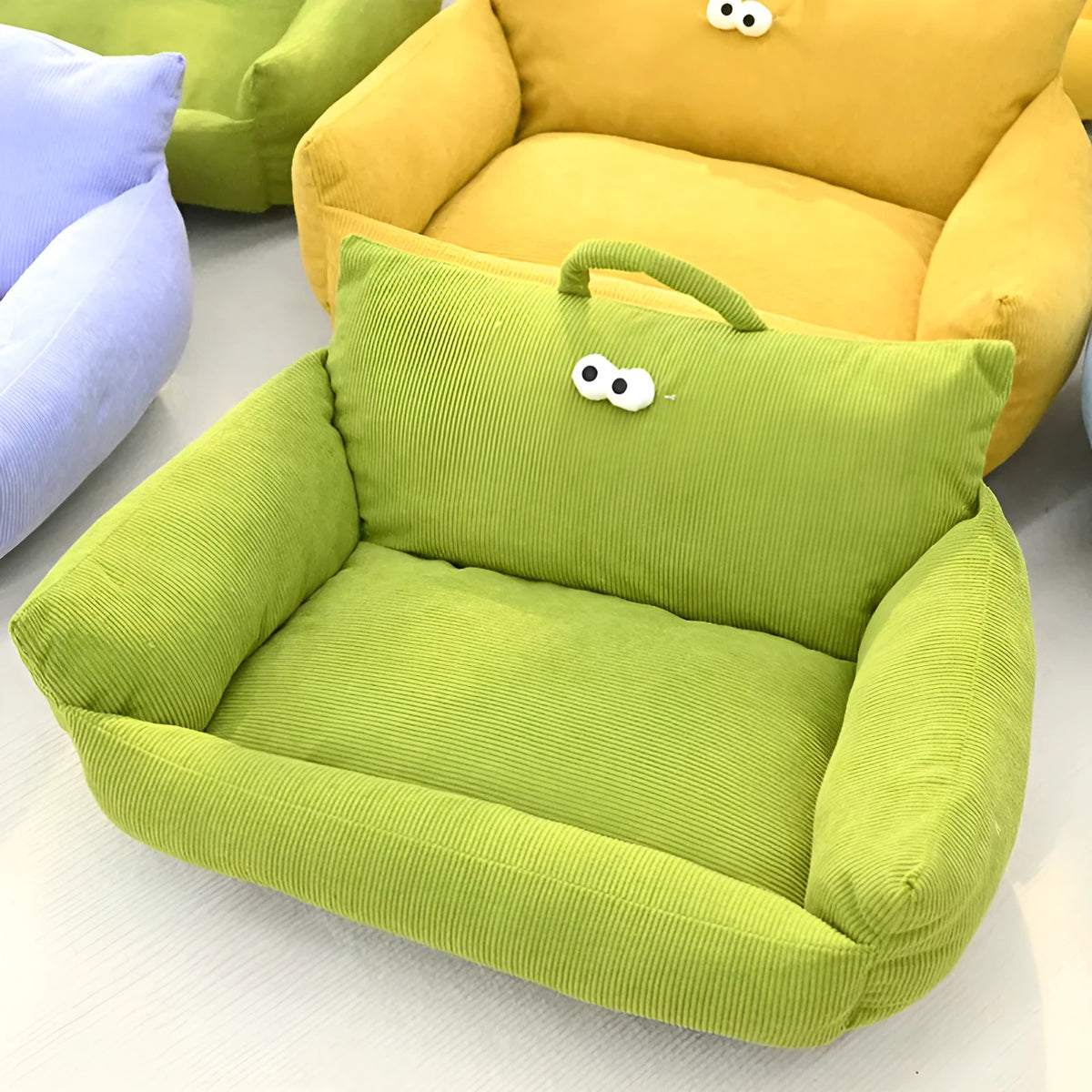Cartoon big eye pet bed sofa kennel in blue colour with raised sides and PP cotton filling